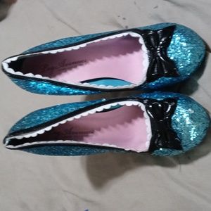 Bnwot or box, leg avenue high heels in blue glitter and black bow.